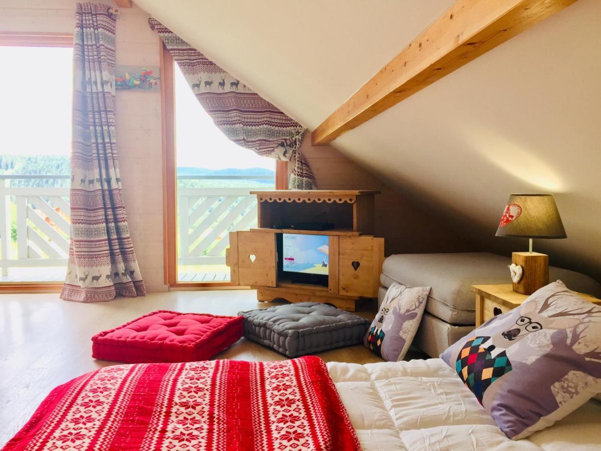 Chalet Le Flocon Bleu - Mauselaine Avec Vue Sur Le Lac De جوراردُميه المظهر الخارجي الصورة
