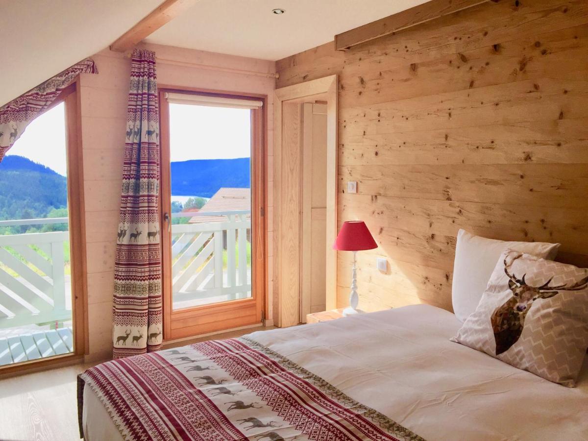 Chalet Le Flocon Bleu - Mauselaine Avec Vue Sur Le Lac De جوراردُميه المظهر الخارجي الصورة